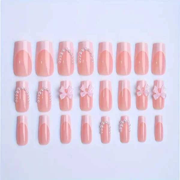 Elevate your manicure with these chic 3D Pinkish Bow Square Fake Nails, featuring a classic white French tip and adorned with delicate faux pearl details. This set of medium-length nails offers a perfect blend of playful elegance and sophistication. The 3D bow accent adds a touch of charm, making them ideal for special occasions or adding a fashionable twist to your everyday look. Easy to apply and long-lasting, these nails provide a salon-quality finish at home.