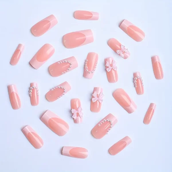 3D Pinkish Bow Square Fake Nails, featuring a classic white French tip and adorned with delicate faux pearl details