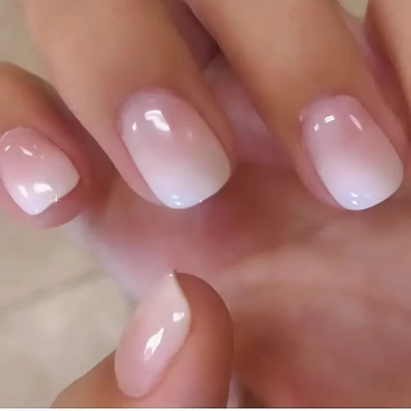 24-piece pink and white gradient mixed color oval short nail set for a delicate, fairy-inspired look.