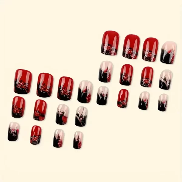 Glossy red press-on nails with flame design for a bold, medium-length manicure.