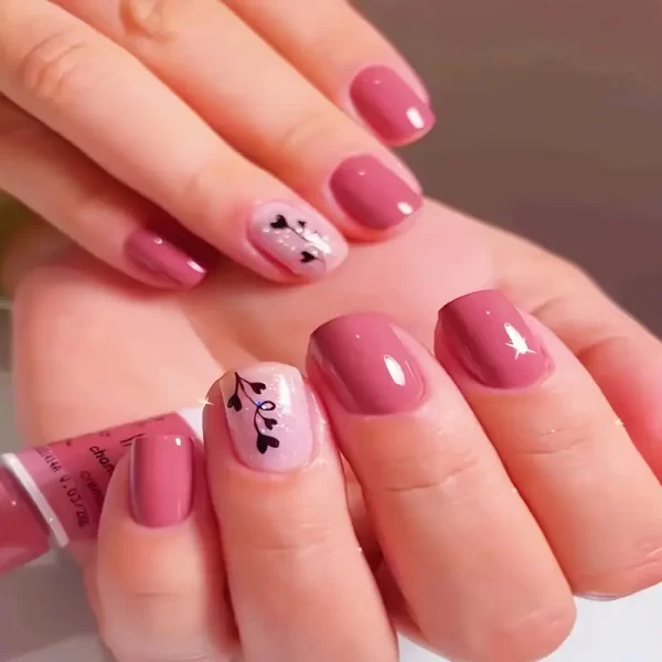 24pcs short pink square press-on nails with glossy finish and love heart glitter accents.